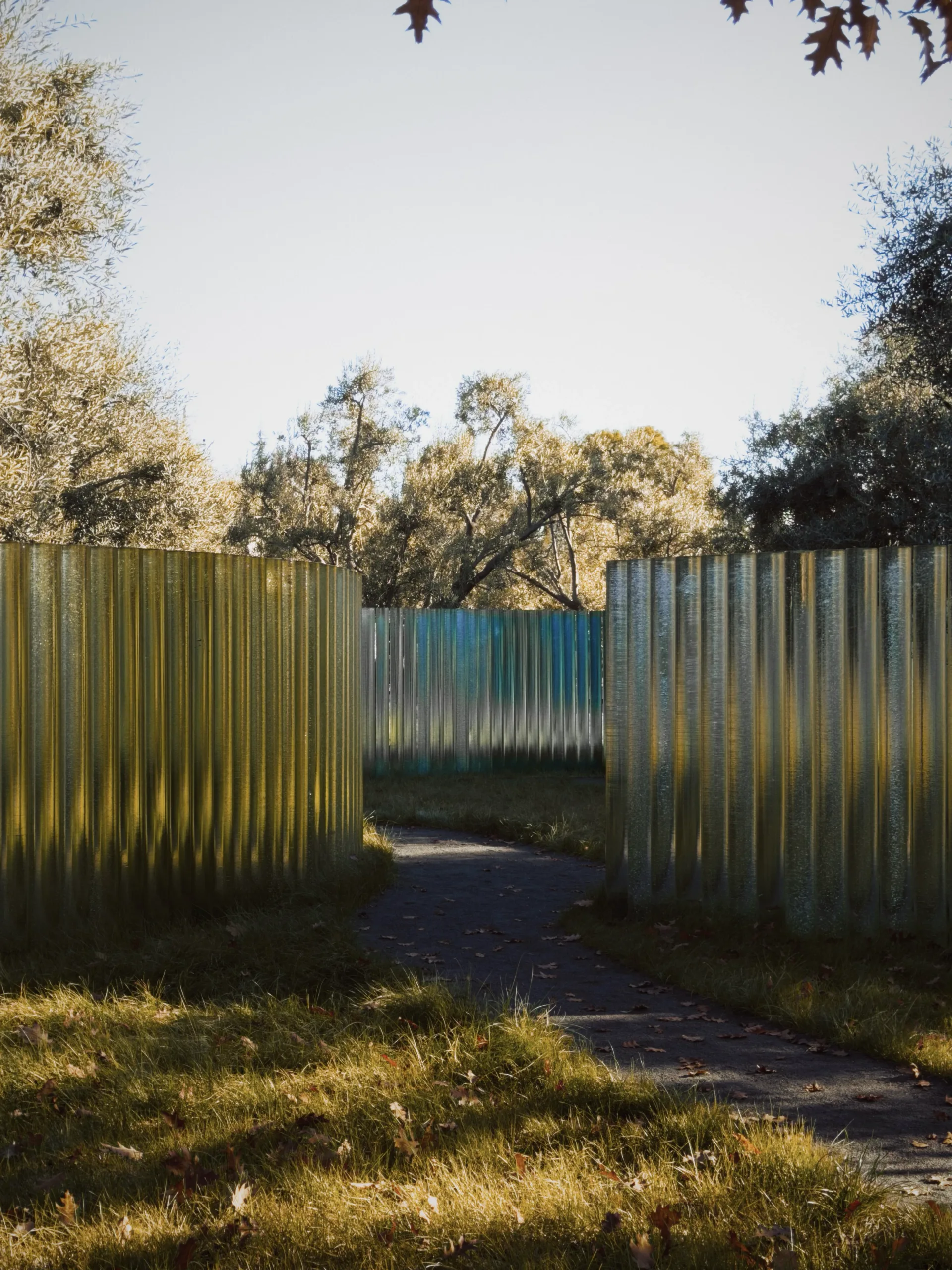 A softly lit garden path near glass architecture in Cupertino.