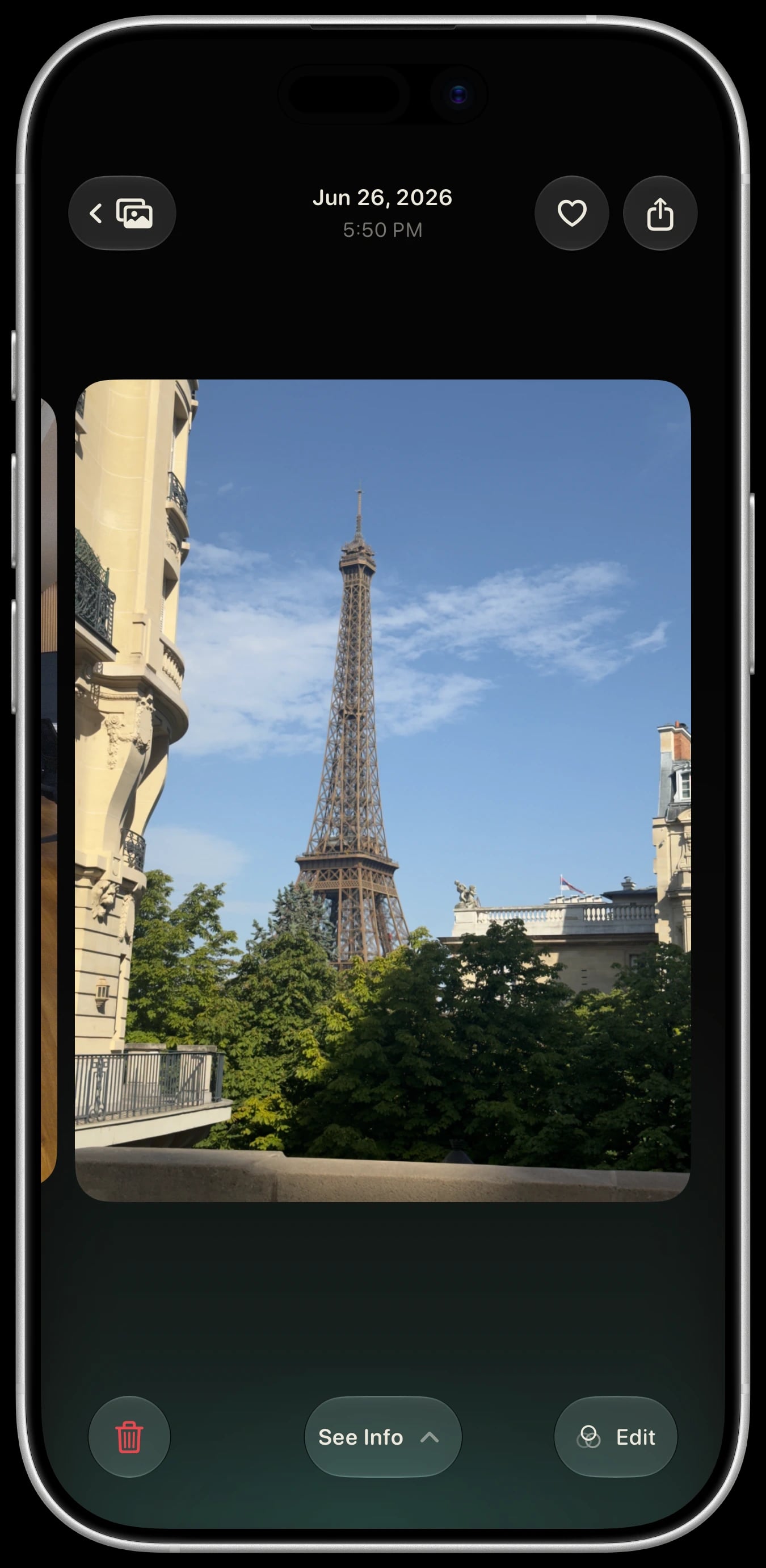 Sundae Gallery photo detail on a white iPhone 17, showing the Eiffel Tower and the Edit action.