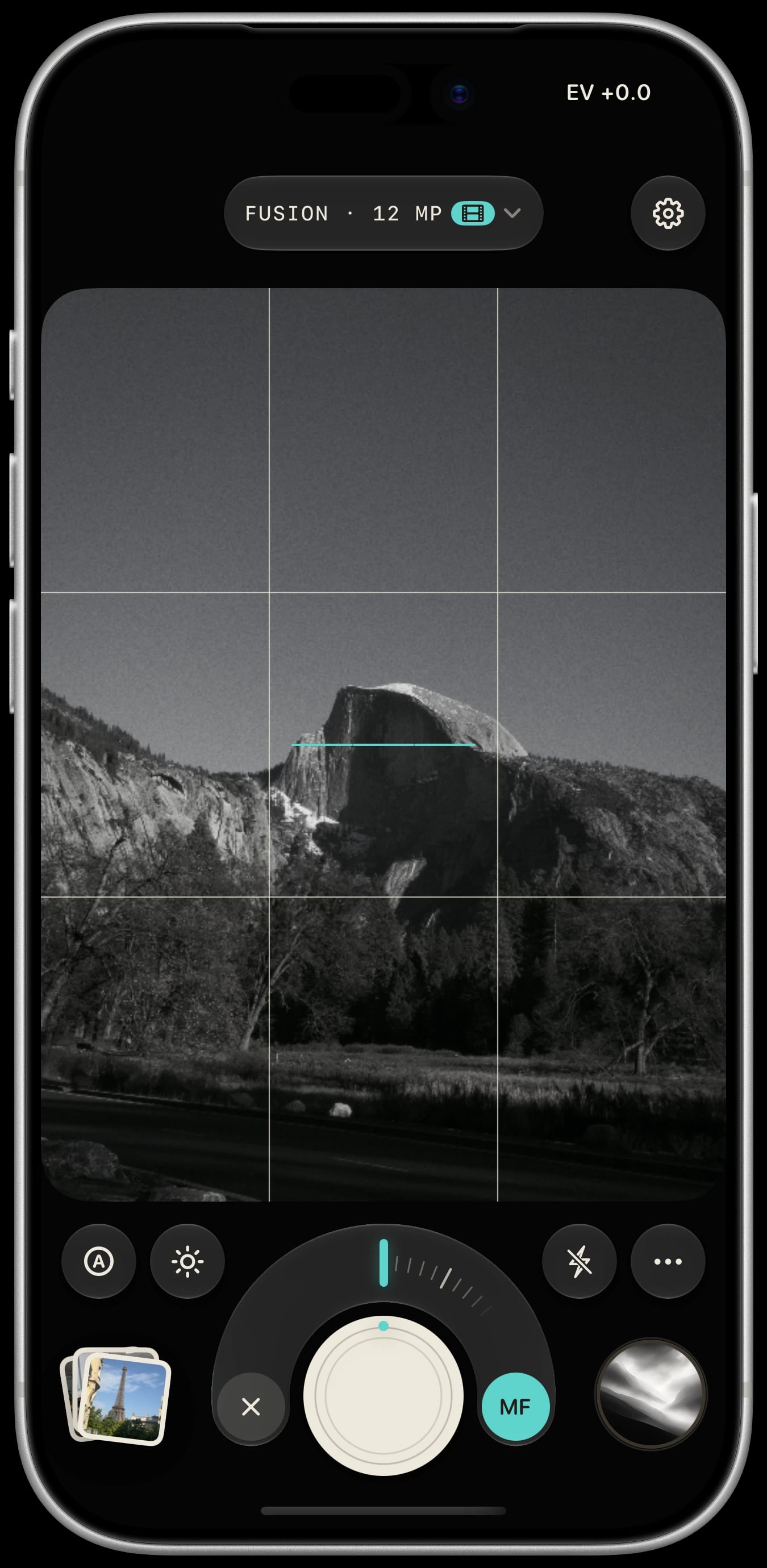 Sundae camera on a silver iPhone 17 Pro, showing manual focus over an Ansel view of Half Dome.