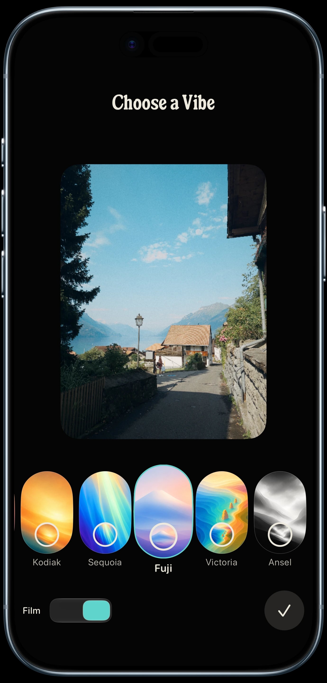 Sundae Vibe picker on a sky blue iPhone Air, with Fuji and Film selected for a lakeside village.