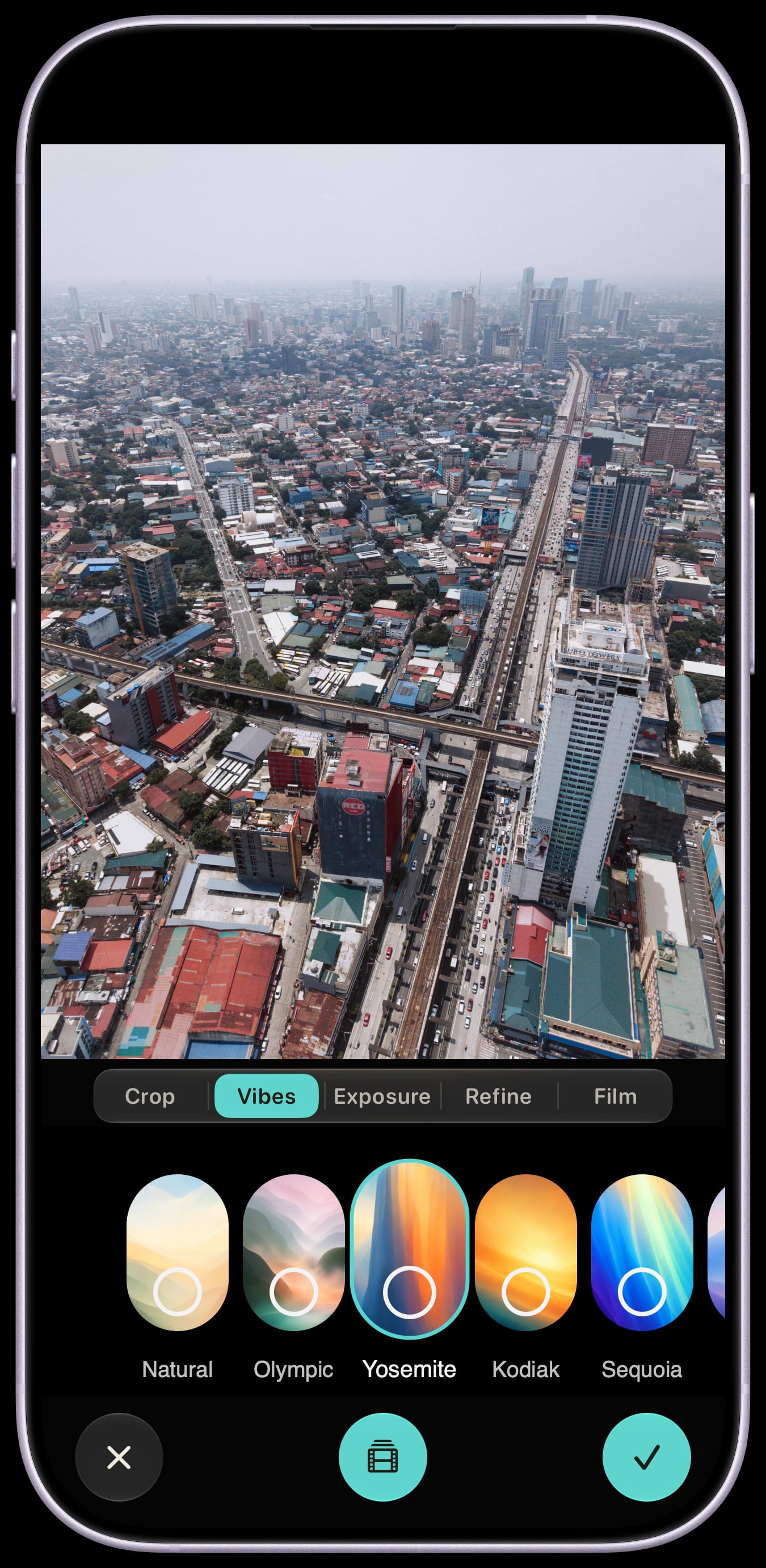 Sundae Gallery Editor on a Lavender iPhone 17, previewing a DJI Mini 5 Pro city photograph with Yosemite selected in the Vibes panel.
